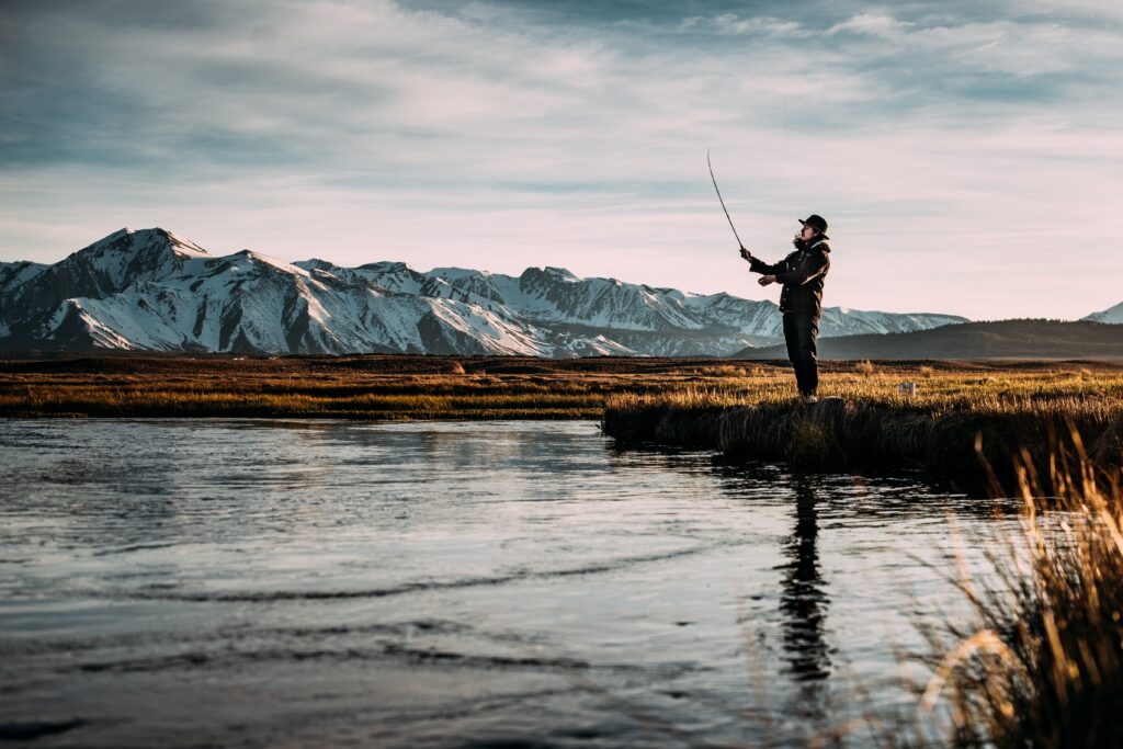 A man fishing, not phishing.